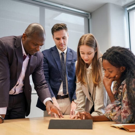 Business people in the workplace are discussing a working strategy for doing business